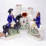 Two Staffordshire figures of Dick Turpin and Tom King, together with a watch stand