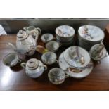 An early 20th century Japanese egg shell porcelain tea service