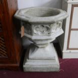 Two octagonal reconstituted stone Gothic style fonts, on stepped base, H.74 W.61 D.61cm (2)