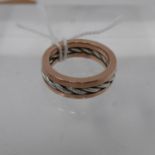 A boxed, designer Stephen Einhorn 9ct rose gold and sterling silver ring, size: N, 7.7g. Complete