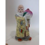 An early 20th century Chinese Republican porcelain figure, H.16cm