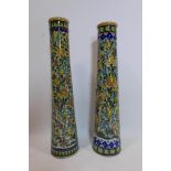 Two Persian Isfahan bamboo vases, of tapered form decorated with flowers, H.70cm