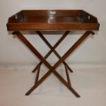 A 19th century mahogany butlers tray on folding stand, H.92 W.74 D.52cm