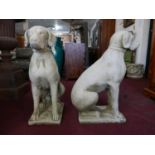 A pair of reconstituted stone seated hounds, H.72cm (2)