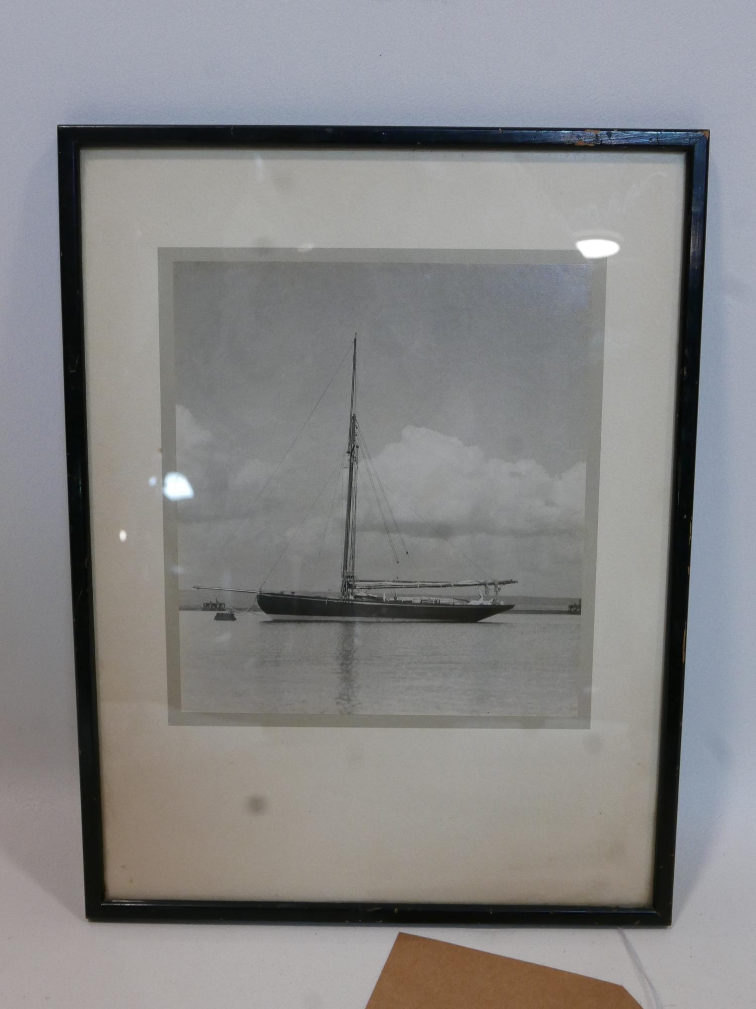 A photographic print of a yacht, framed and glazed, 21 x 19cm