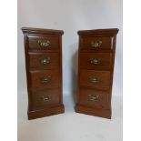 A pair of late Victorian walnut pedestal chests of four drawers, raised on stepped base, H.90 W.40