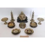 A collection of Chinese brass items to include a Buddha, a pair of pagoda's, tazza's etc
