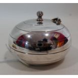 A Christofle silver plated ashtray of ovoid form, marked to base, the hinged lid with knopped