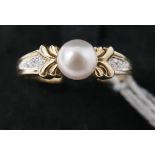 An 18ct yellow gold, cultured pearl and diamond ring, Size: O, 2.7g