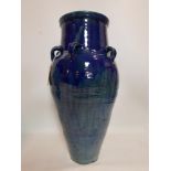 A Persian blue glazed Sharab wine vessel, H.88cm