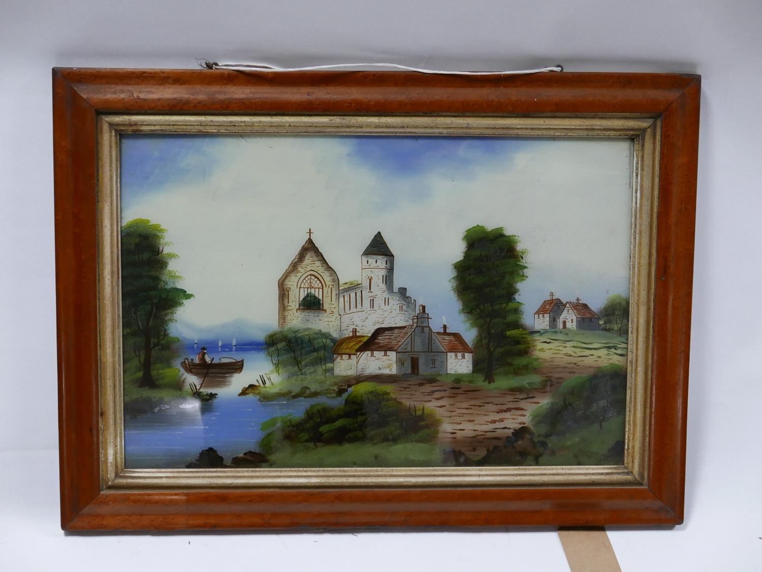 A painting on glass depicting a church by a coast, set in maple frame, 40 x 60cm