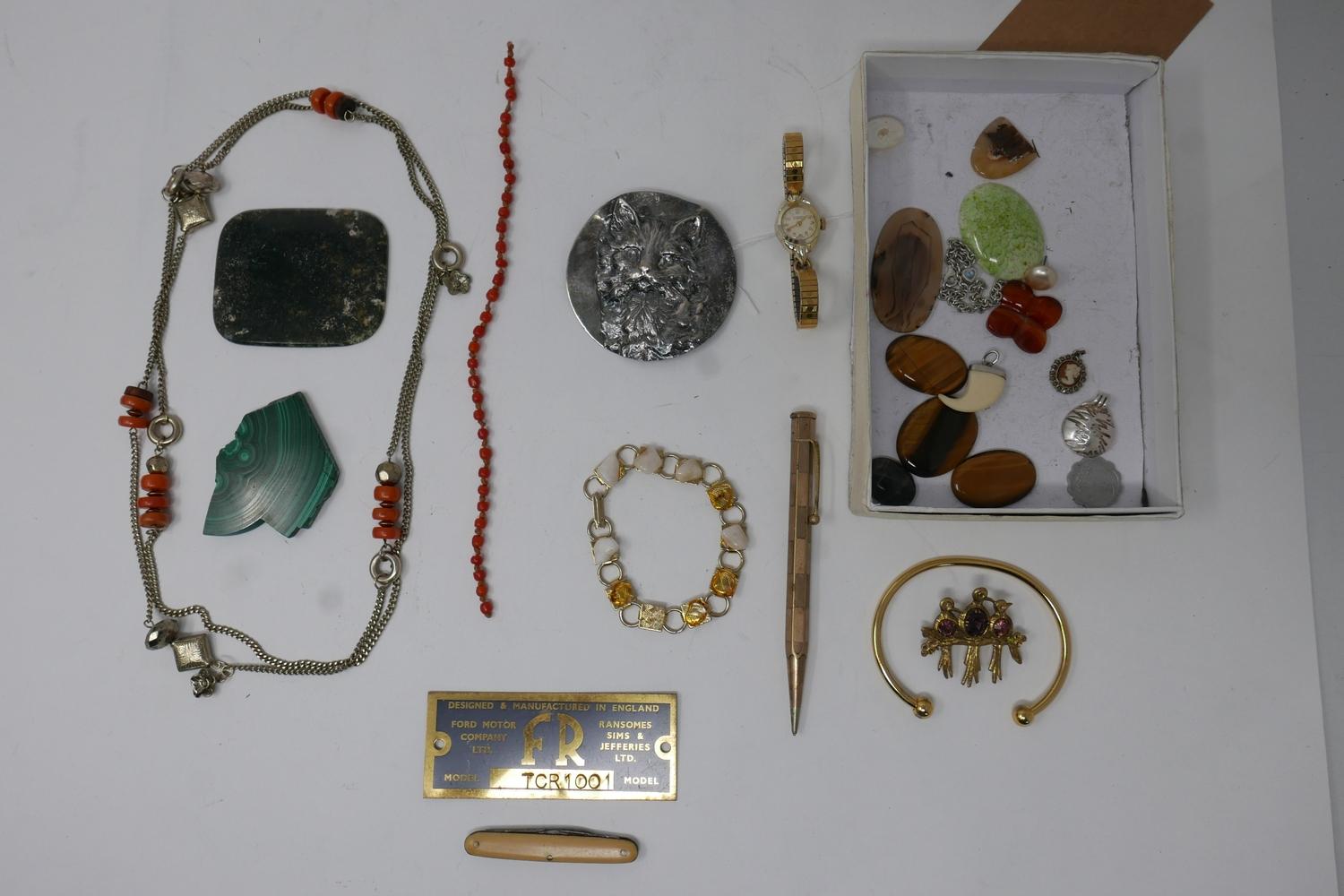 An assortment of vintage costume jewellery to include a rolled gold propelling pencil, an antique