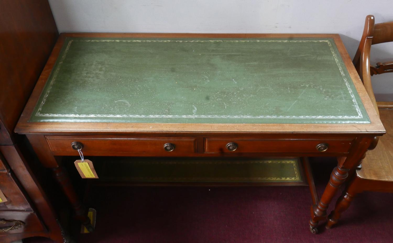 An Edwardian mahogany writing table, two drawers, green leather skiver, raised on turned legs and - Image 2 of 2