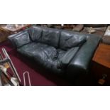 A Giovani Sforza collection green leather sofa