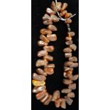 A natural Baltic amber necklace of graduated pebble form, L: 46cm, 73g.