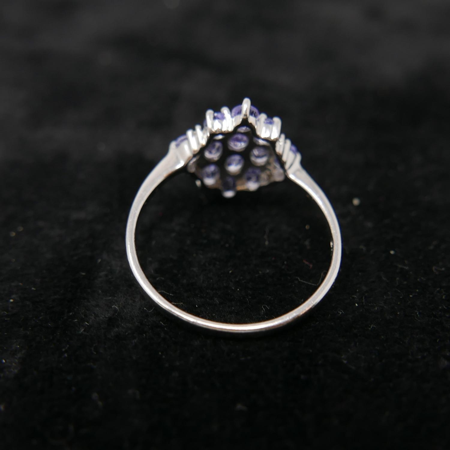 A boxed 9ct white gold marquise-shaped ring set with diamonds and tanzantites, Size: W 1/2, 3g. - Image 2 of 2