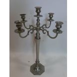 A cast metal four branch candelabra, H.63cm