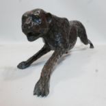 A cast bronze leopard, H.23 W.108 D.23cm