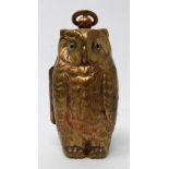 A brass sovereign case in the form of an owl