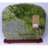 A spinach green hard stone plaque, 37 x 38cm
