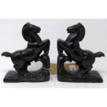 A pair of bronze horse bookends