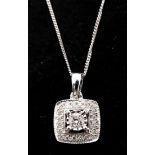 A boxed 18ct white gold and brilliant cut diamond square-shaped pendant on an 18ct white gold chain