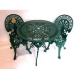 A green painted cast aluminium garden table and chairs