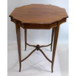 An Edwardian inlaid mahogany occasional table, raised on splayed tapered legs, joined by