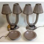 A pair of ceramic table lamps with matching bowls with labels for masse fourmaintraux