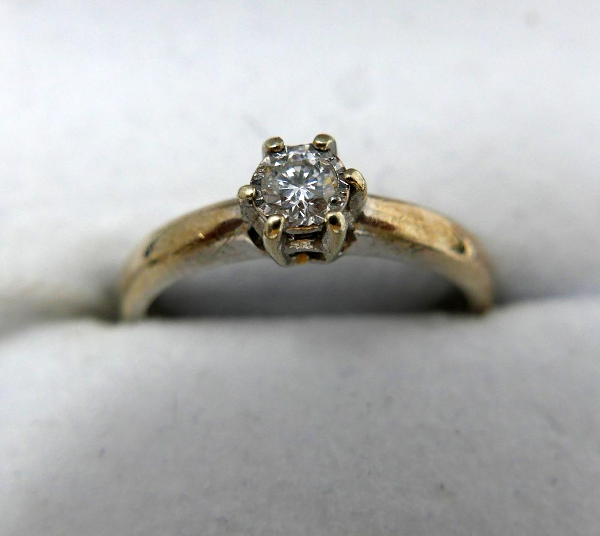 A 9ct white gold and diamond solitaire ring, 0.33carats, 2.5grams