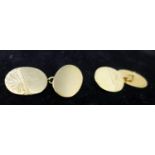 A boxed pair of 9ct yellow gold cufflinks