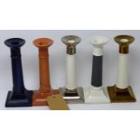 Five ceramic candle stick holders