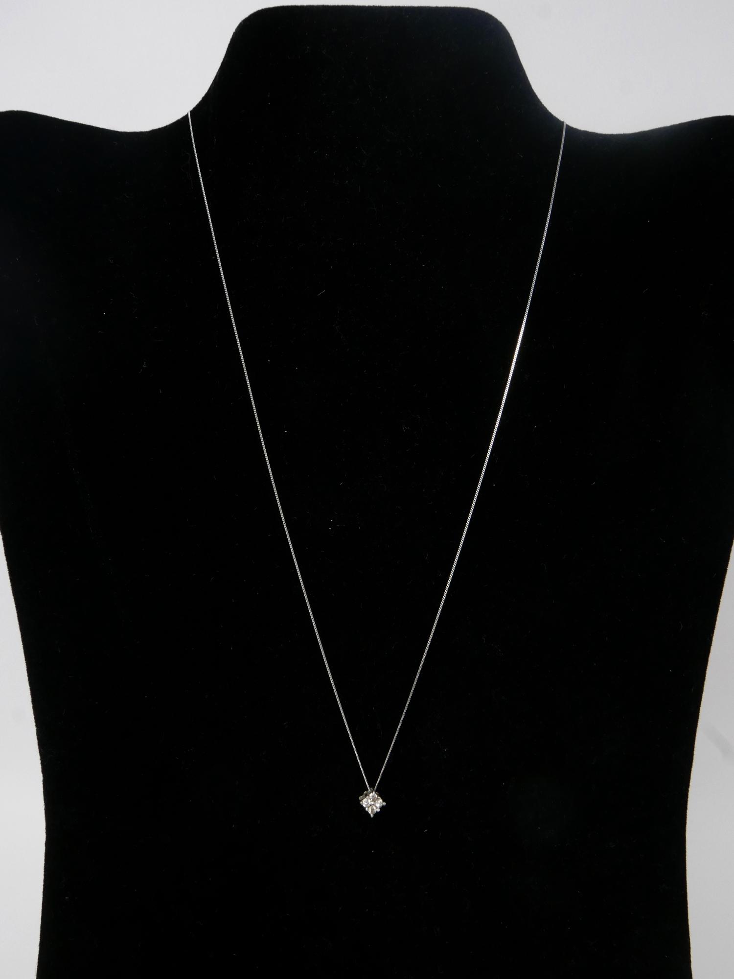 A 10ct white gold and diamond pendant set with 4 stones on white gold chain, in box, 1 gram - Image 2 of 2