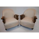 An Art Deco oak three piece bergere suite