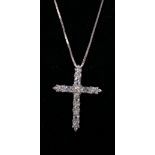 A sterling silver and white crystal studded crucifix pendant on a sterling silver chain