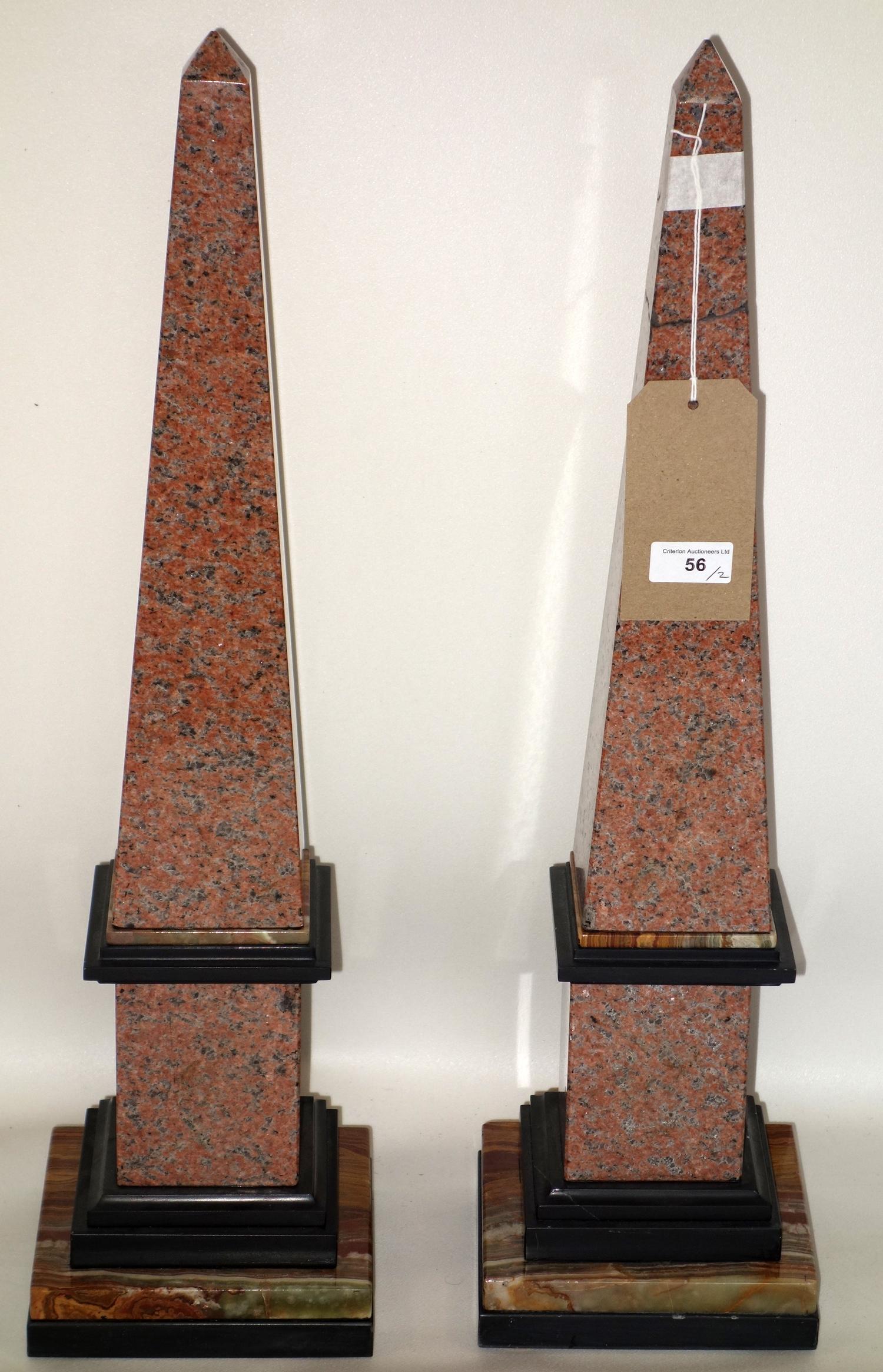 A pair of marble and onyx obelisks, one repaired, H.66cm