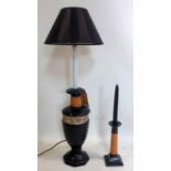 A contemporary ceramic table lamp with matching candlestick holder