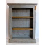 A contemporary painted bookcase with adjustable shelves, H.127 W.92 D.35cm