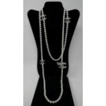 A long necklace of freshwater pearls with crystal-studded spacers, over 1 metre in length