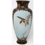 A Chinese cloisonne enamel vase, decorated with vignettes of a flying duck and birds amongst