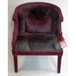 An Empire style flocked and goat skin chair