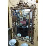 A Rococo style gilt mirror, 95 x 57cm