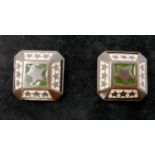 A pair of vintage designer green and white enamelled metal clip earrings by Jean Paul Gaultier,