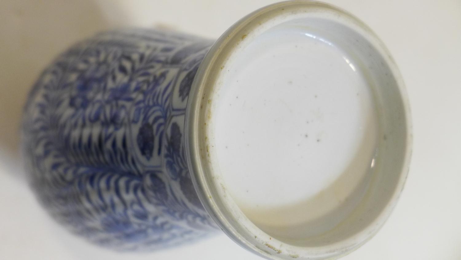 A Chinese Kang Xi period blue and white porcelain vase with floral decoration, H.25cm - Image 2 of 2