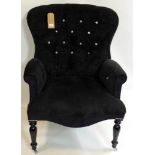A Victorian style chair with buttoned upholstery