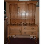 An Arts & Crafts style oak dresser, H.195 W.140 D.51cm