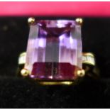 A boxed 14ct yellow gold ametrine and diamond ring