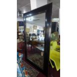 A large contemporary black framed mirror, 217 x 141cm