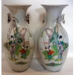 Two Chinese twin handled vases, painted with a lady and children in a garden setting, H.46cm (2)