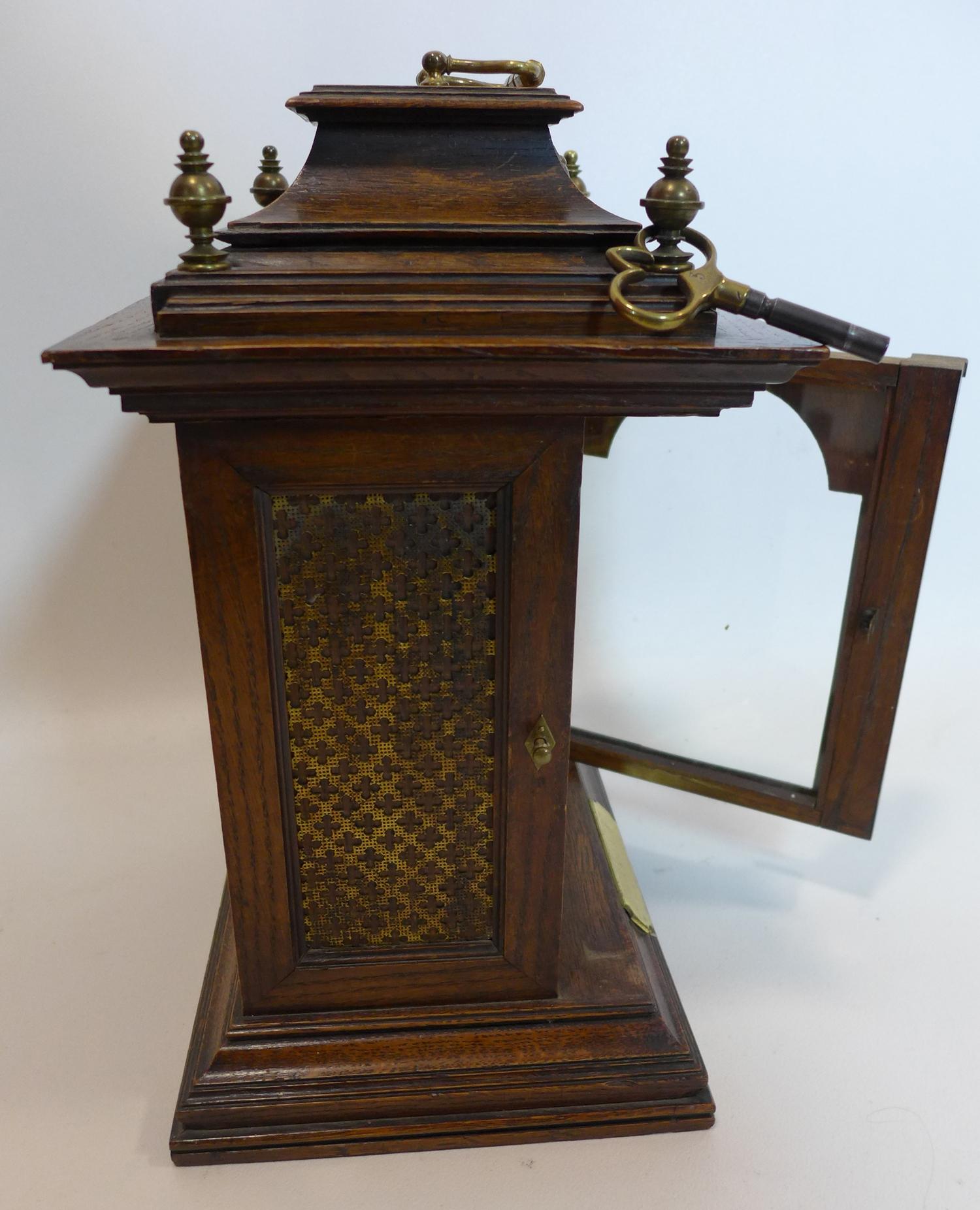 An early 20th century oak mantle clock with brass dial, the movement stamped Lenzkirch, H.35 W.23 - Image 4 of 5